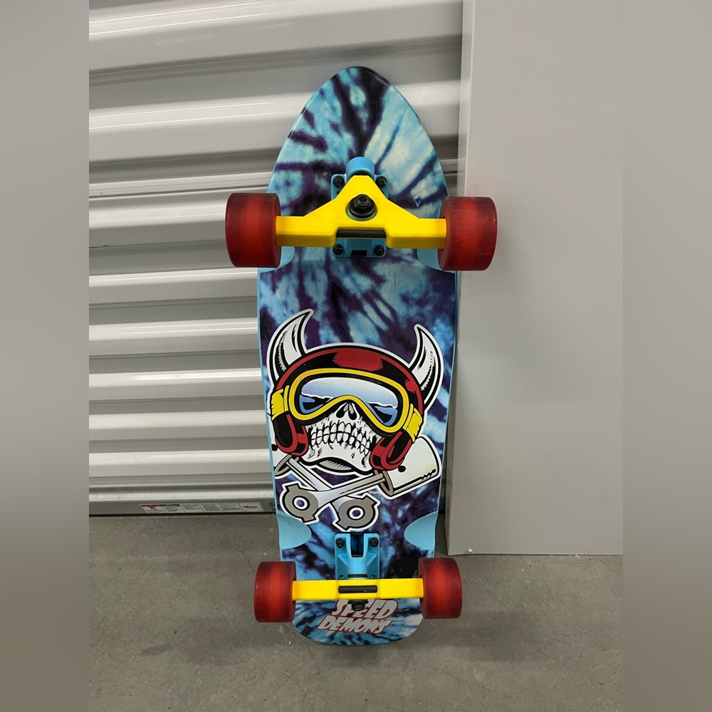Colorful Skateboard with Red, Yellow, and Blue Design